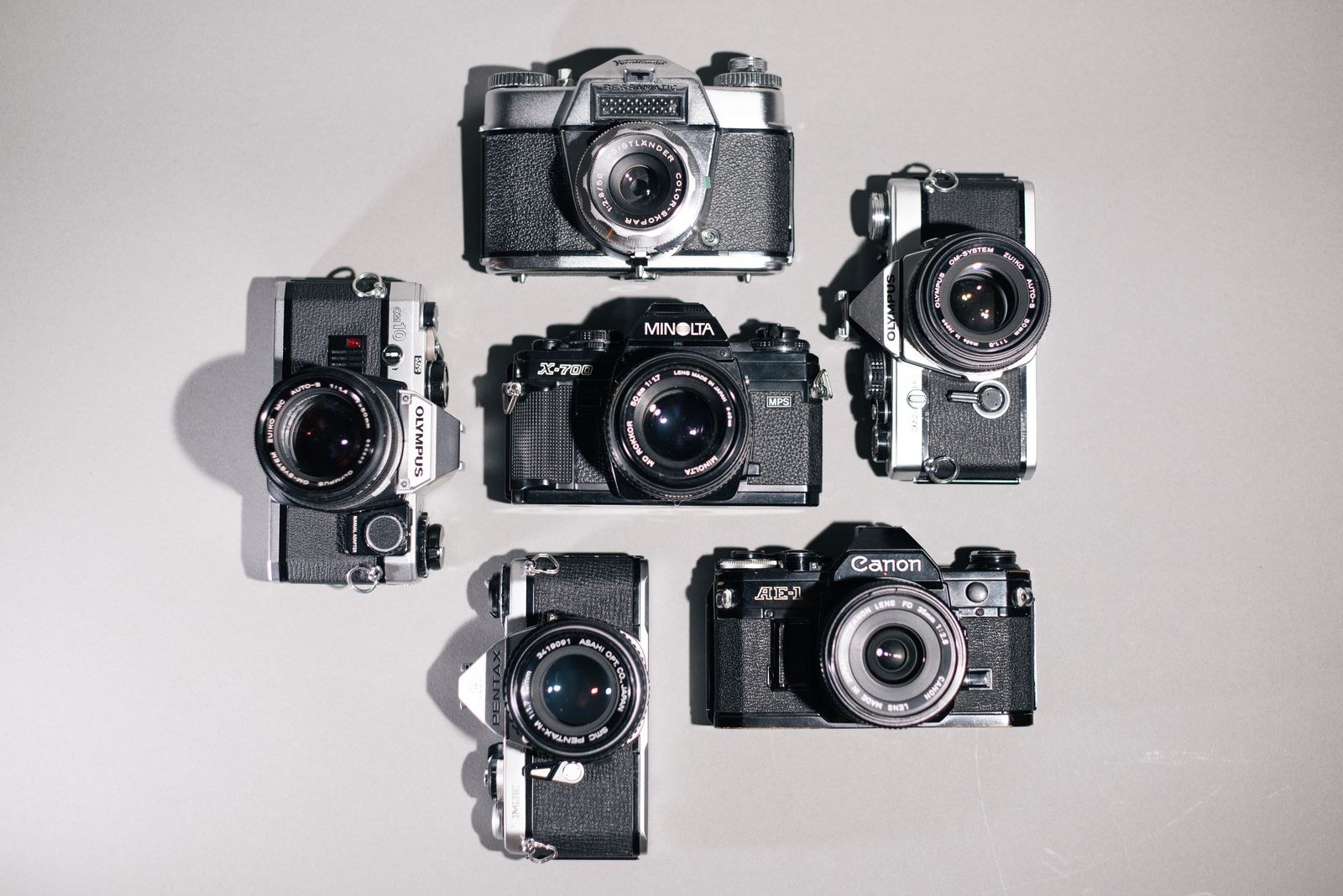 Camera and editing gear laid out flat