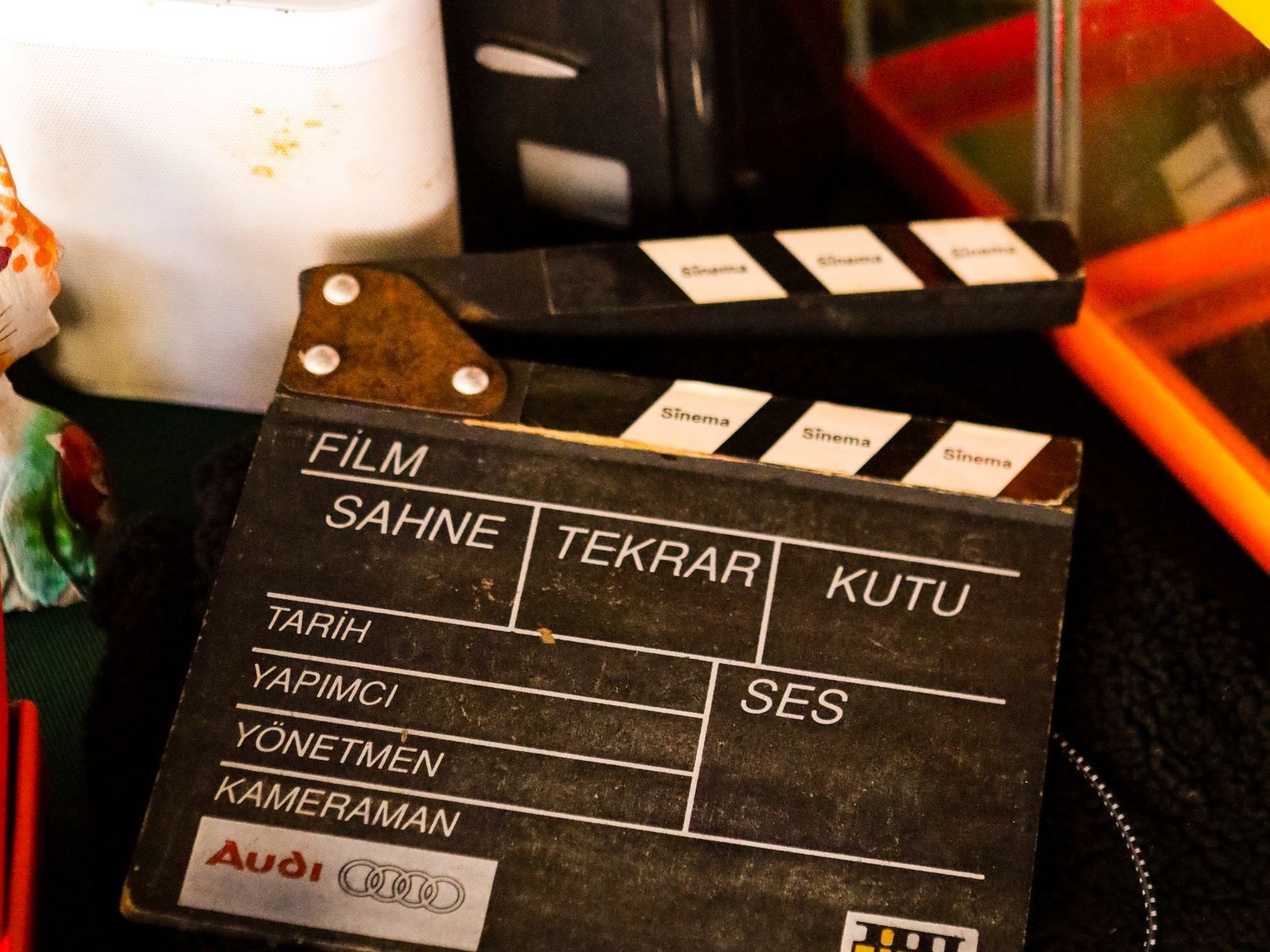 Camera and clapperboard on a film set